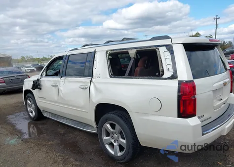2015 Chevrolet Suburban 1500 Ltz z USA, uszkodzony, nr VIN 1GNSKKKC3FR144854